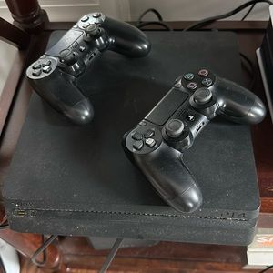 Sony PlayStation 4 with 2 wireless controllers